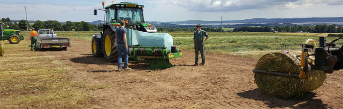 Wrapping bales of wholecrop (cereal and legumes) for feed on 12th July 2017 on Balruddery Farm near Dundee, Scotland.  